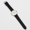 Full Image of Max Bill 38mm Automatic Watch White Dial with Lines but no date is a modernist classic designed wrist watch with black 20mm leather band.