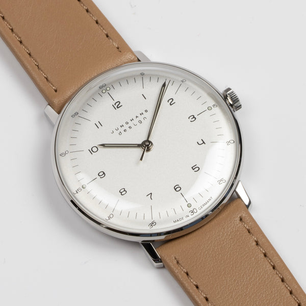 Max Bill 34mm Hand wound watch in White Dial with Numbers designed for Junghans in 1961  with 42 Hour Power Reserve in 316L stainless steel case number 27/3701.02 a classic modernist design available at OK.