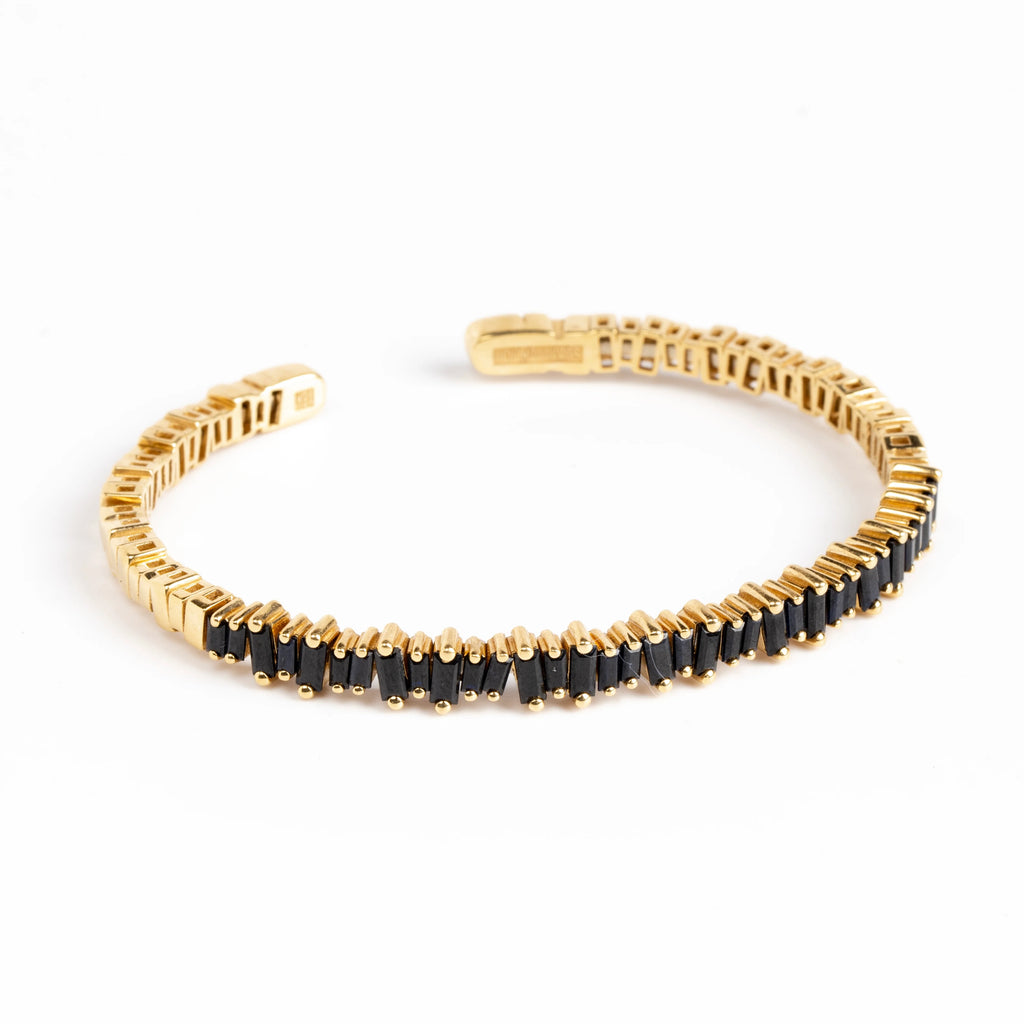 Black Sapphire Baguette Reborn Bangle Bracelet by Suzanne Kalan AKB454 is a prong set balck sapphire flexible sparkly on trademarked fireworks setting.