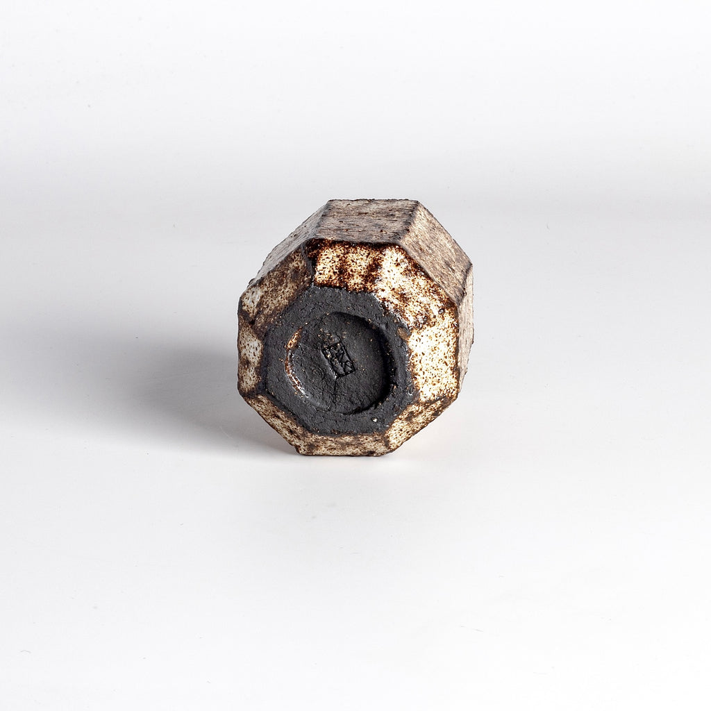 Stamp on sanded Kurinuki Yunomi Teacup from Muzuri ware by Kyriacos Mouzouris in London UK.