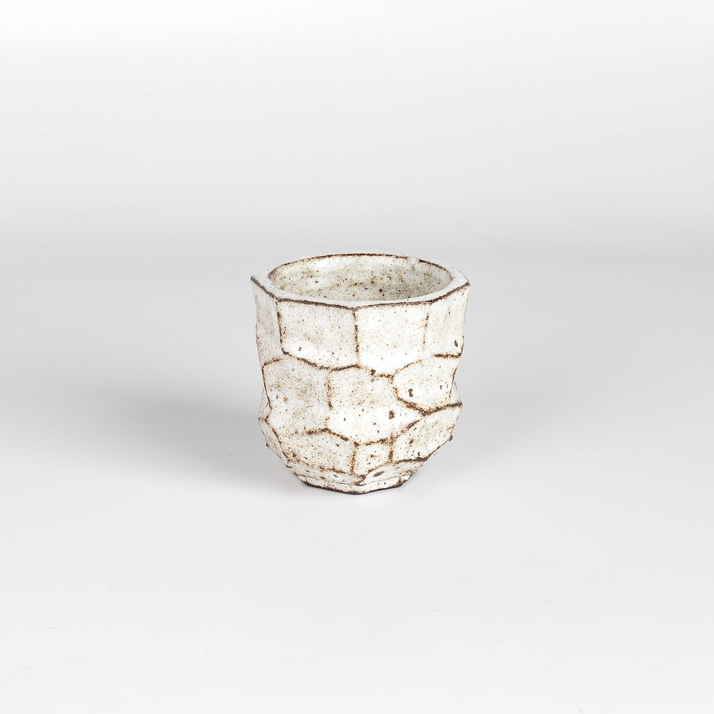 Carved and white Kurinuki Yunomi Teacup from Muzuri ware by Kyriacos Mouzouris in London UK.