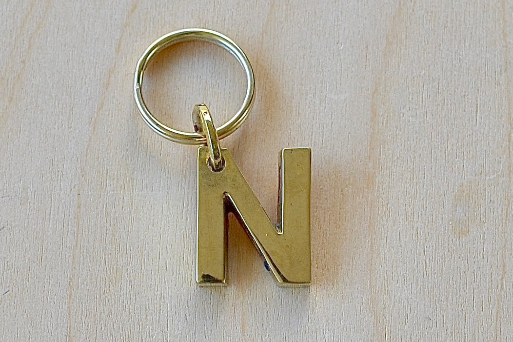 'N' Letter keyring, key chain, key ring in brass made by Carl Aubock. 