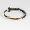 Gold Dust Pat Flynn Nail bracelet in 22k gold and iron from the back.