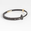 Nine Stone 9 Bracelet Large is a forged nail bracelet with nine scattered accent diamonds and completed with an 18k gold hinge and ball catch closure sized for men.  Handcrafted in New York.