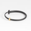 Back of large forged nail bracelet by Pat Flynn.