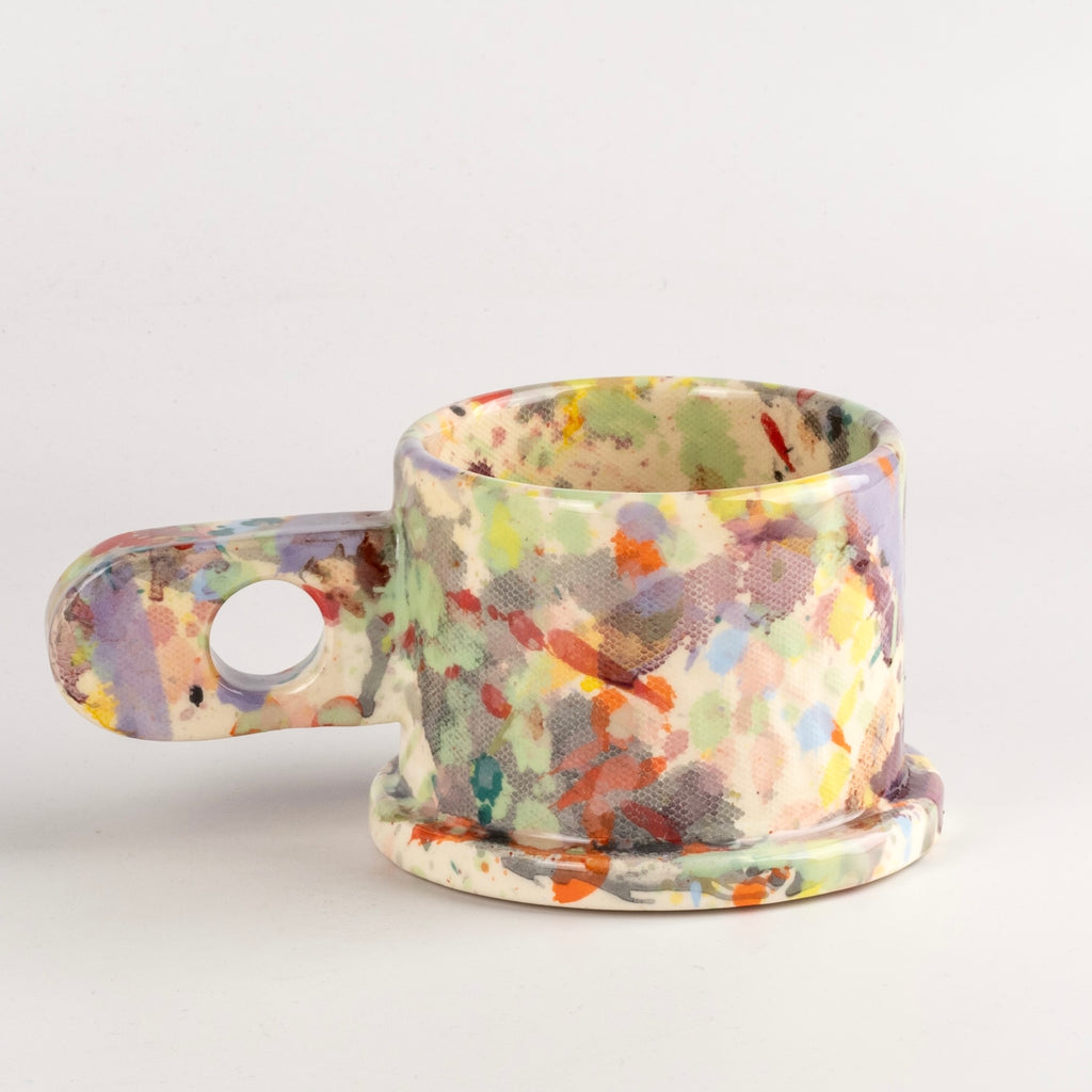 Other side of EXP Standard Splatter Mug in Pastel Green Stripe with Yellow by Peter Shire and Echo Park Pottery.