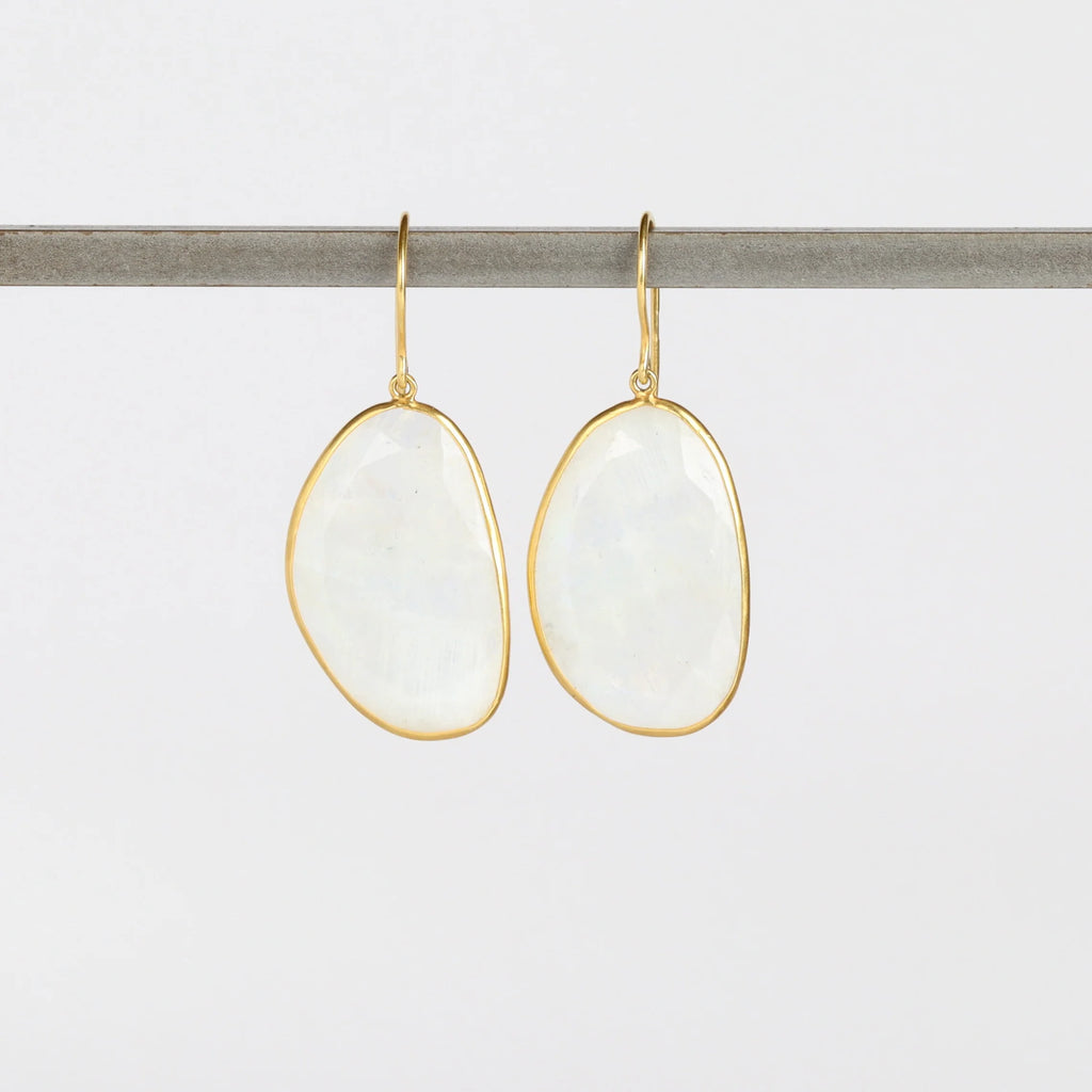 First Frost Large Single Moonstone Drop Earrings by Pippa Small are translucent, lightly faceted and bezel set stones on ear wire in 18k yellow gold.