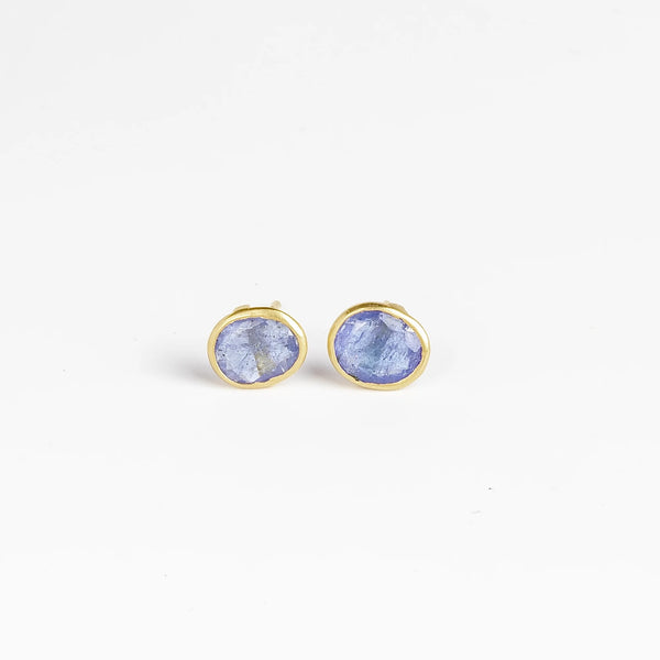 A new and smaller version of Pippa Small Classic Stud studs earrings in Tanzanite and 18k yellow gold.