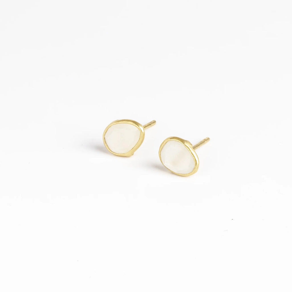 Moonstone stud earrings on white.