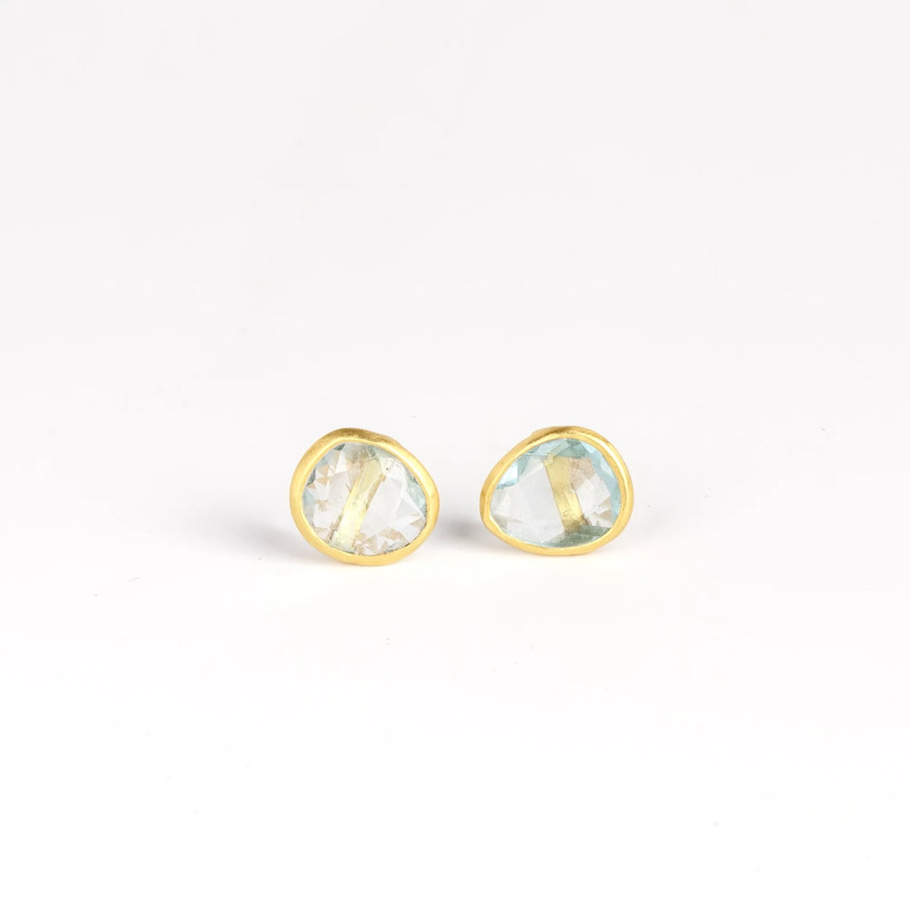 A new and smaller version of Pippa Small Classic Stud studs earrings in aquamarine and 18k yellow gold.