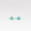 Angled view of the  smaller version of Pippa Small Classic Stud studs earrings in Turquoise and 18k yellow gold.