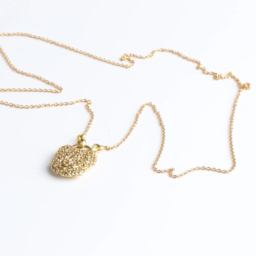 Small River Diamond Baguette Fuzzy Pave "Petite Coeur de Fantasie" Pearl Padlock Necklace designed by Polly Wales on white background.