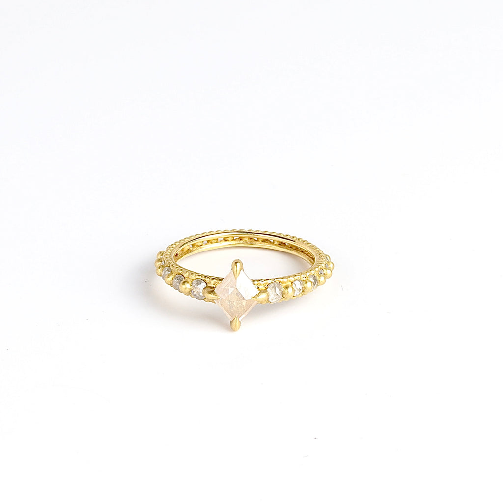 One of a kind OOAK Ghost Diamond ring by Polly Wales iin size 6.5 is a custom ring with central fancy white diamond&nbsp;(~1.07CT) and gradiating colored side accent stones on a Rapunzel band. Cast in Place. Cast not set. Handcrafted in Los Angeles.