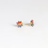 Side view of Rainbow Daisy studs (pair) by Polly Wales on white background.