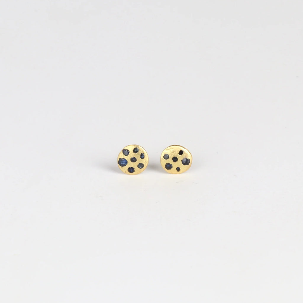 Polly Wales XS XSmall extra small Confetti Celeste Disc Stud Earrings in mid blue to navy Sapphires are classic, 18k recycled yellow gold disc earrings with blue in various shades sapphires, cast not set, cast in place and made in Los Angeles.