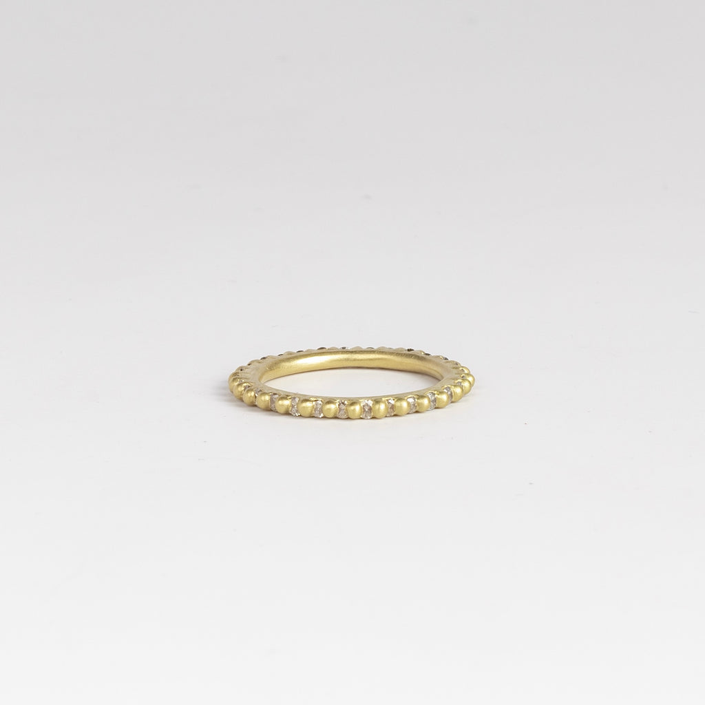 Rita Diamond Ring by Polly Wales is a Rapunzel, eternity  band with white diamonds (~.88tcw). Cast in Place. Cast not set. Handcrafted in Los Angeles.