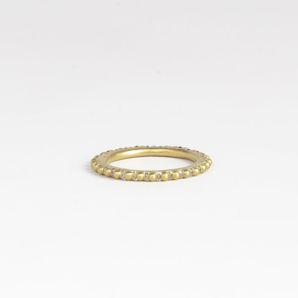 Rita Diamond Ring by Polly Wales is a Rapunzel, eternity  band with white diamonds (~.88tcw). Cast in Place. Cast not set. Handcrafted in Los Angeles.