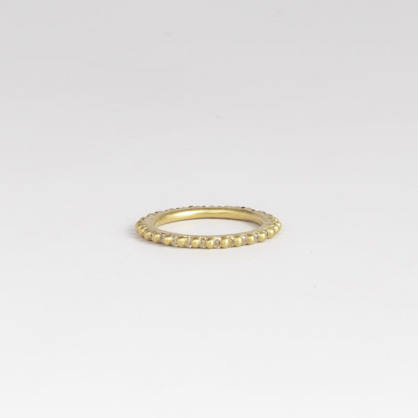 Rita Diamond Ring by Polly Wales is a Rapunzel, eternity  band with white diamonds (~.88tcw). Cast in Place. Cast not set. Handcrafted in Los Angeles.