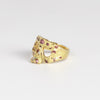 Side view of Mini Confetti Skull Plum Blossom signet ring by Polly Wales 
