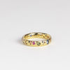Rainbow Confetti Ring Band by Polly Wales is a narrow 18k gold band with speckled mixed sapphires around the circumference for a beautiful confetti-like appearance. Recycled gold. Cast not set. Handcrafted in Los Angeles.