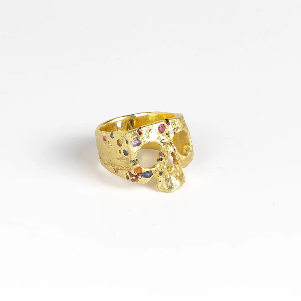 Alternate view of rainbow confetti skull ring by Polly Wales on white background.