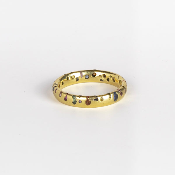 Polly Wales Classic Rainbow Confetti Band Ring in 18k recycled yellow gold with green, yellow, orange, blue, purple and pink sapphires and cast not set size 8.