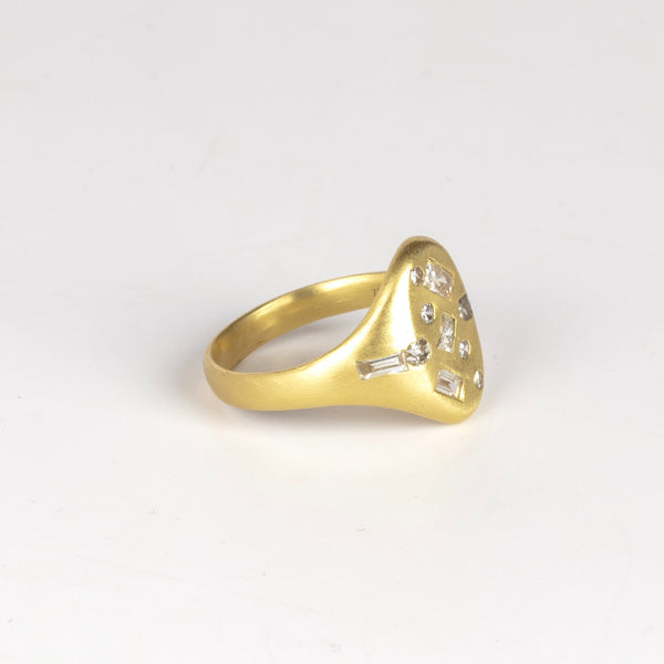Side view of the unisex Harlequin Diamond Confetti Signet by Polly Wales in  matte 18k gold and mixed cut white diamonds size 6.5.