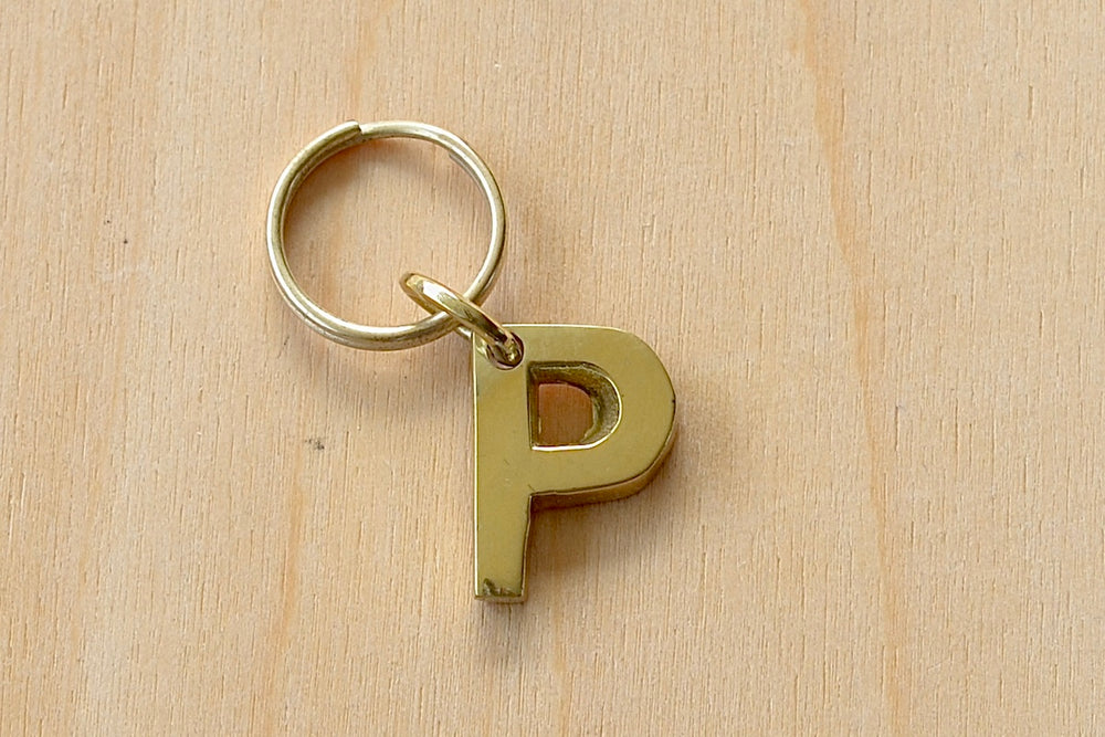 'P' Letter keyring, key chain, key ring in brass made by Carl Aubock. 