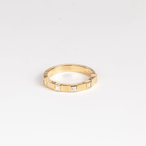 Pleated Five Stone Band Diamond Carre by Retrouvai is a wedding band ring made out of five carre cut diamonds in a pleated 14k yellow gold band. Size 6.5 in stock