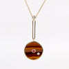 Compass Pendant in Tigers Eye and Pink Spinel by Retruvai on 14k gold chain.
