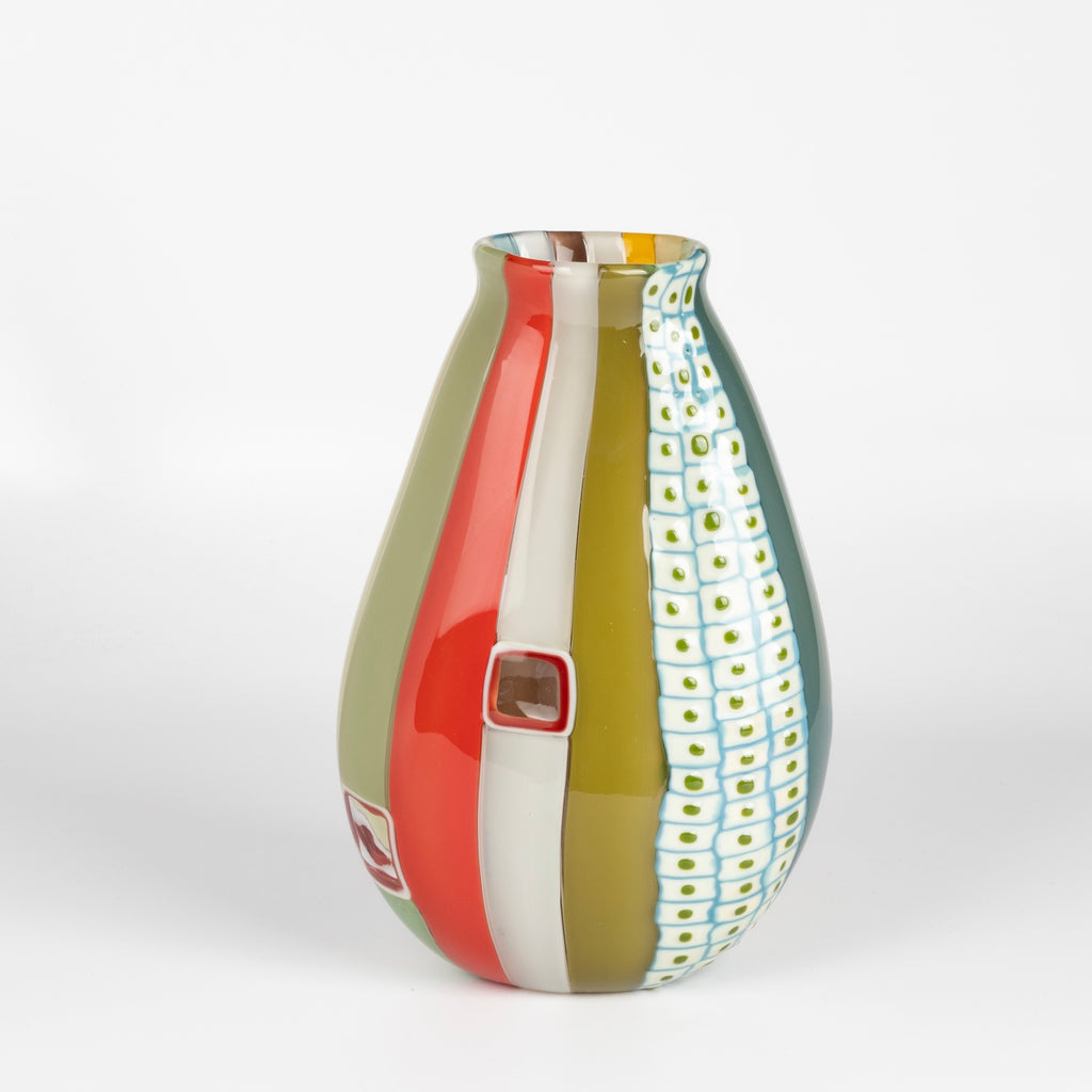 Robin Mix Medium Flat Cane Murrini Vase with Windows 9" is a flat cane vase with Murrini and windows by Robin Mix. His sensibilities come from his training in Scandinavia, but is produced using the most sophisticated and iconic of traditional modernist Italian techniques