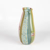 Side view of flat cane vase with murrini and windows.