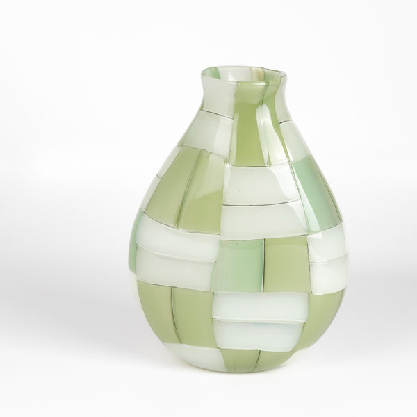 A large basketweave vase designed by Robin Mix in Tunbridge Glassworks, Vermont. Hand blown vase in green, using Italian techniques available at OK.
