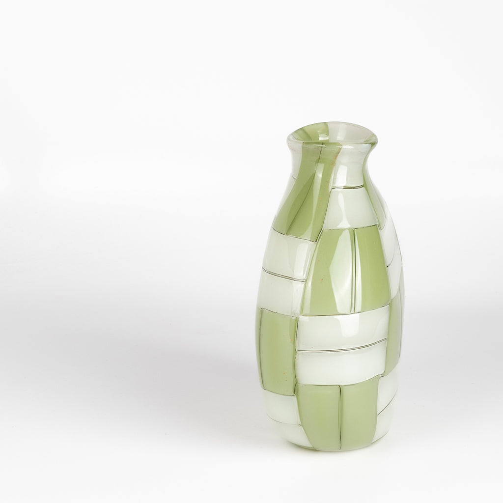 Side view of green basketweave vase by Robin Mix.