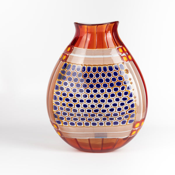 Robin Mix Vintage Vase 11" in deep red with clear glass and blue is a flat cane vase with pezzati and murrini vase by Robin Mix. His sensibilities come from his training in Scandinavia, but is produced using the most sophisticated and iconic of traditional modernist Italian techniques.