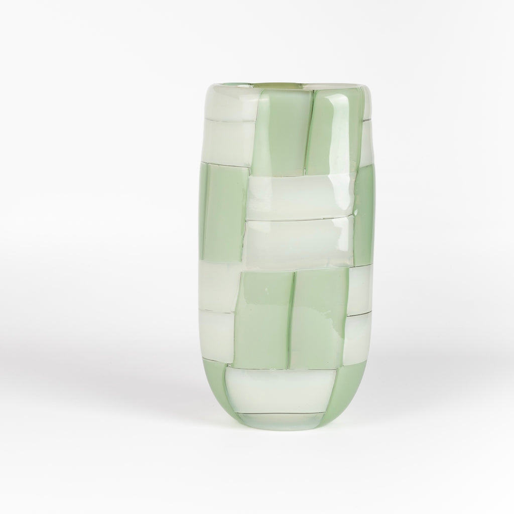 n  oval cylinder basketweave vase in green and white by Robin Mix whose sensibilities come from his training in Scandinavia, but is produced using the most sophisticated and iconic of traditional modernist Italian techniques. Vase is signed. 