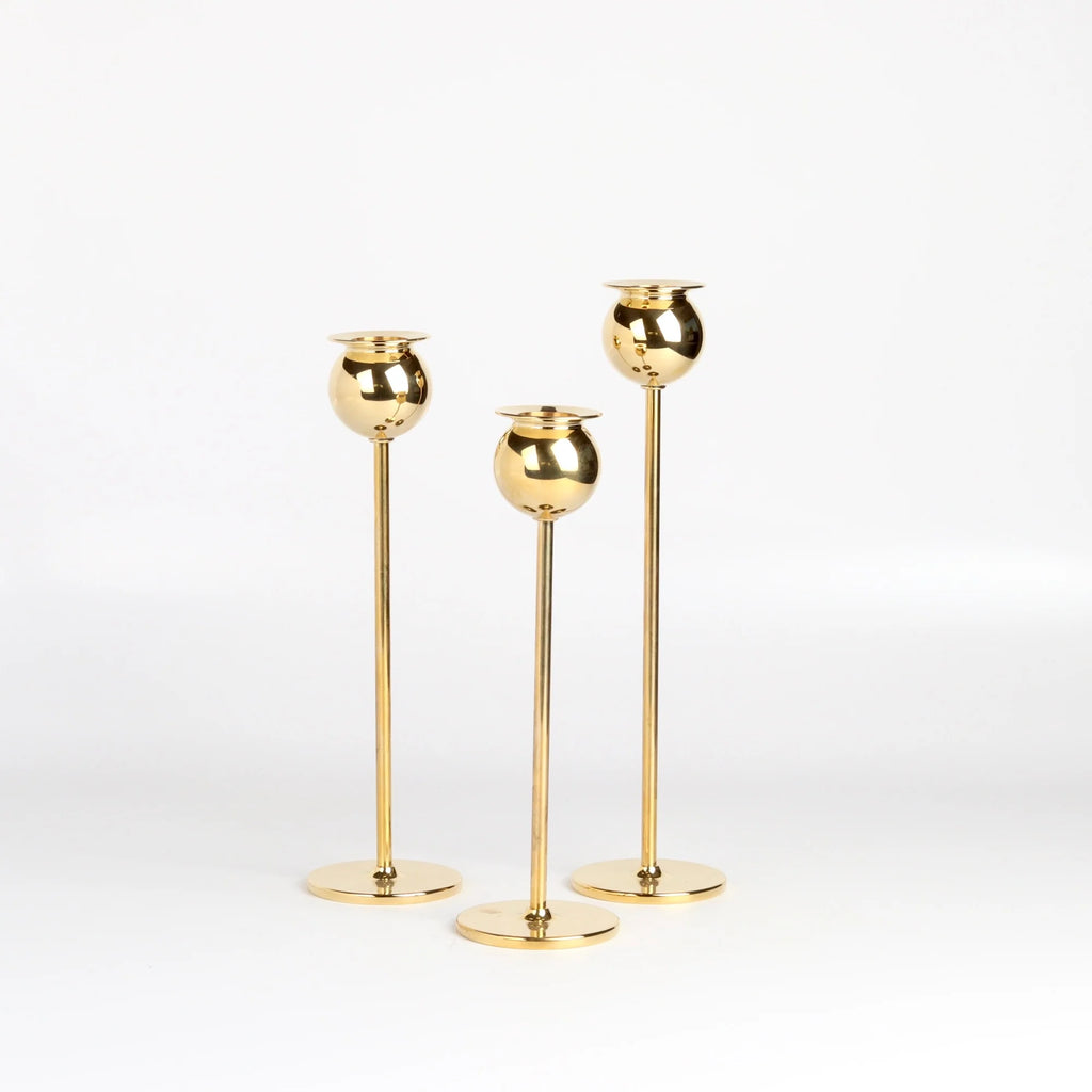 Brass Tulip Candle Holder Set of 3 three on white background.