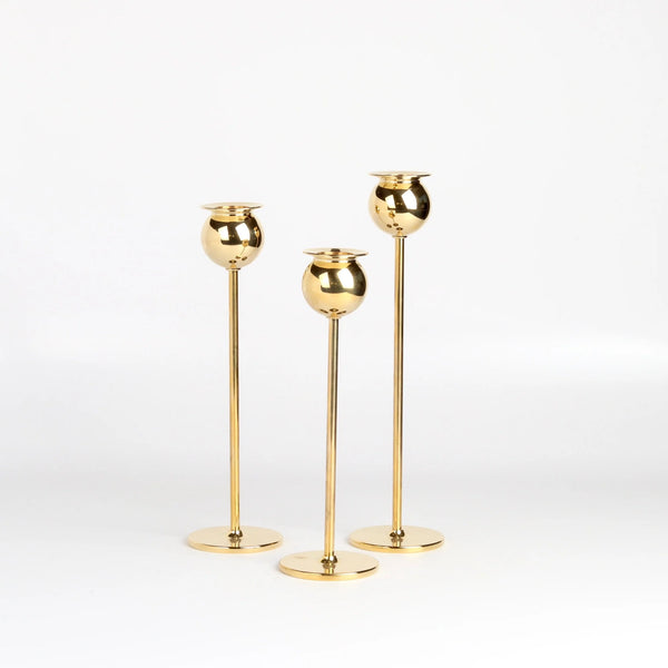Brass Tulip Candle Holder Set of 3 three on white background.