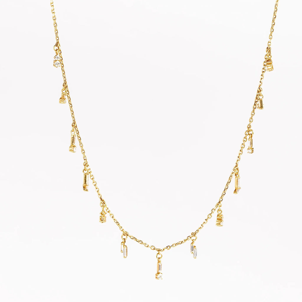 Mini Diamond  Dangle Necklace by Suzanne Kalan is an 18k gold chain necklace with mixed drop dangles in white diamond baguettes and round diamonds.