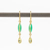 Moon and Drop Earrings by Tej Kothari are a double stone earring comprised of a smooth cabachon in chrysoprse and a teardrop in peridot. Both stones are set in 18k yellow gold with gold ear wire.