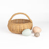 Birds eggs in a basket toy is a great carry along toy made out of a rattan basket and 12 eggs, mimicking bird eggs in a farm, painted in beautiful muted colors with speckled details.