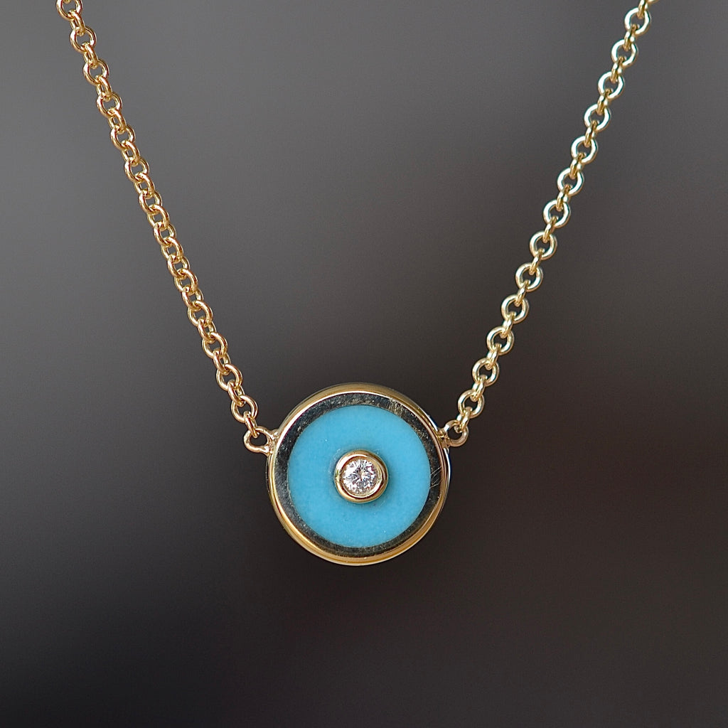 Retrouvai Mini compass pendant in turquoise.