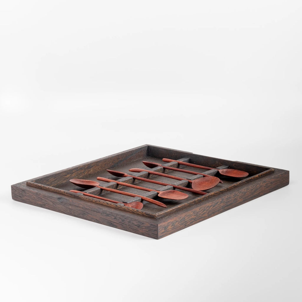 Box set of seven handcarved spoons. A box set of seven hand carved wooden spoons. Originally created for Central Restaurant in Lima, Peru, these spoons, made from scraps of wood from the Amazon forest bridge the gap between ancient crafts and modern design, featuring a clean look with beautiful curves and slight grain variations to the wood. These are ment to be used. 