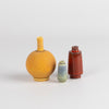 Miniature Hand Thrown Ceramic Vase Trio in Dark Yellow, Bluish Gray and Reddish Brown are three tiny and hand thrown ceramic vases hand thrown by Japanese born, UK based potter Yuta Segawa.