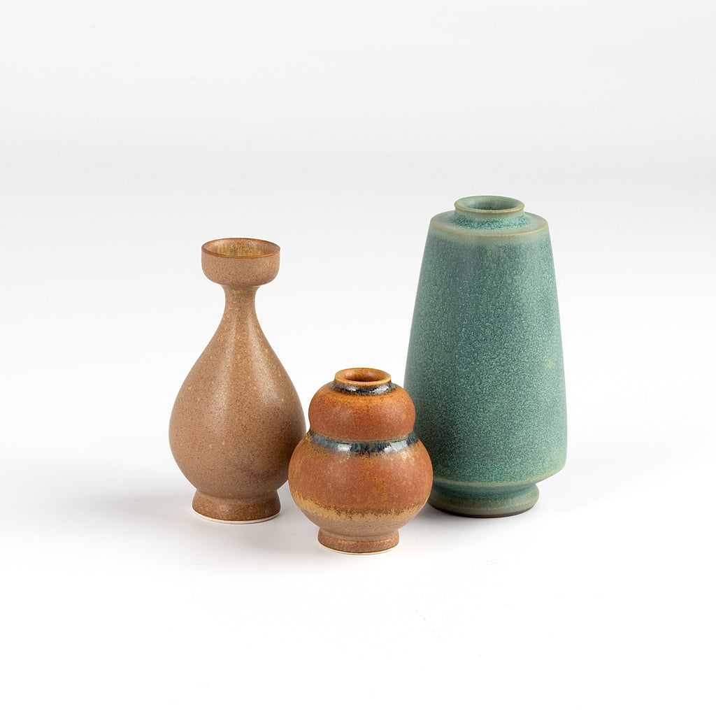 Miniature Hand Thrown Ceramic trio of vases by Yuta Segawa. One brown, one brown woth green stripes and perforations and one muted green.
