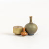 Yuta Segawa Miniature Hand Thrown Ceramic Vase Trio in Green, brown and Taupe against white.