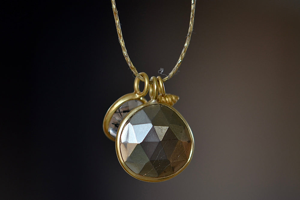 Double Colette Necklace in Pyrite and Rutilated Quartz from the back.