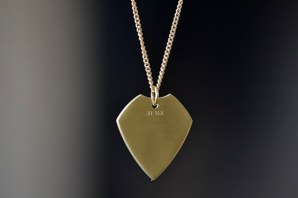 Back of Petal Print Pick Necklace by Kaylin Hertel.