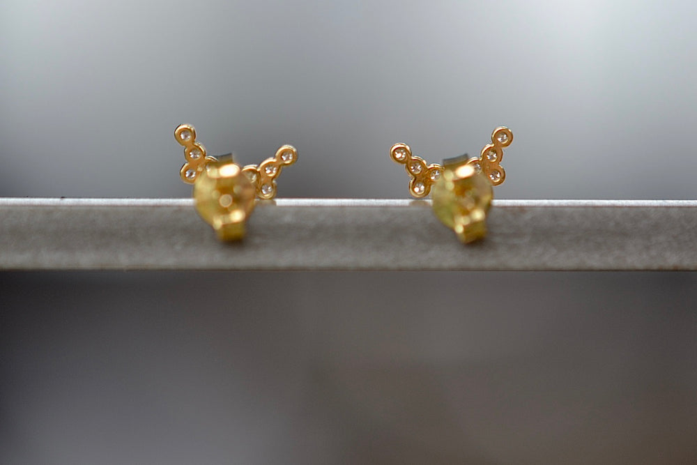 Mini Pétale Studs by Yannis Sergakis from the back.