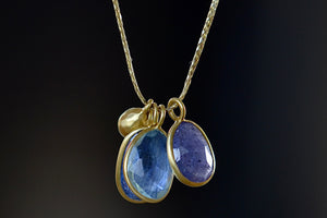 Back of Triple Colette Mixed Blue Necklace in light and space color way by Pippa Small.